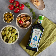 Bono Val di Mazara PDO olive oil dressing, elevating salads with Sicilian flavor.