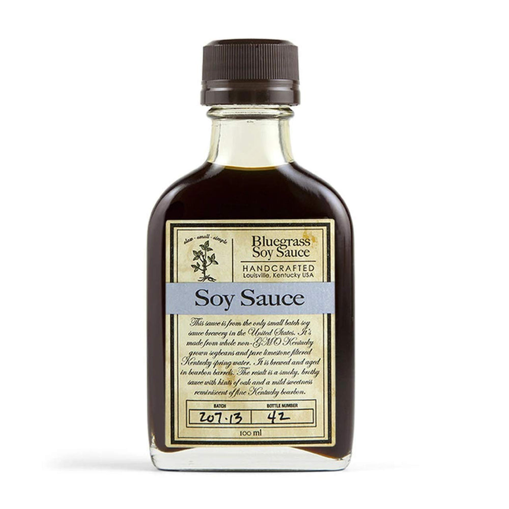 Bluegrass Soy Sauce bottle highlights microbrewed US craft and Kentucky ingredients for savory dishes.