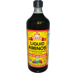 Bragg Liquid Aminos on a dish, adding savory umami to veggies and grains.