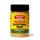 Bragg Nutritional Yeast Roasted Garlic bottle showing dairy-free parmesan substitute for meals