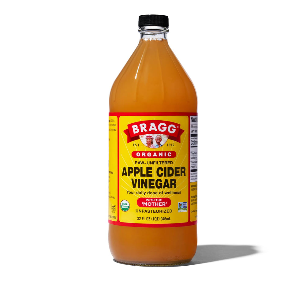 Bragg Organic Raw Apple Cider Vinegar bottle with Mother of Vinegar, ideal for dressings.