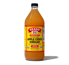 Bragg Organic Raw Apple Cider Vinegar bottle with Mother of Vinegar, ideal for dressings.