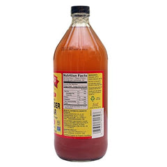 Bragg vinegar being poured to show easy dressing use.