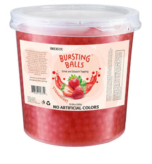 BREXONIC strawberry popping boba pearls close-up showing bursting fruity juice.