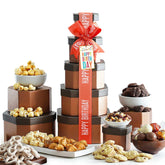 Broadway Basketeers Birthday Gift Basket Tower front view with assorted cookies and candies for celebrations.