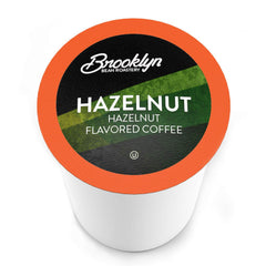 Brooklyn Beans coffee cup with steam showing nutty aroma and balance.