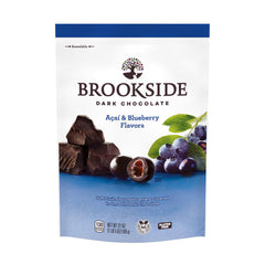 Texture close-up of Brookside morsels in dark chocolate, juicy centers visible.