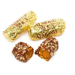 Brown & Haley Almond Roca original toffee texture closeup highlights caramel bite and almond crunch.