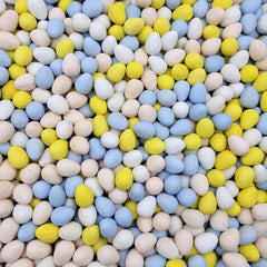 Buha Sweets Bulk Mini Eggs: pastel-colored candy-coated milk chocolate eggs for Easter baskets.