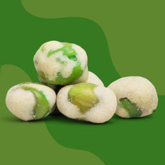 Bright green Wasabi Peas on a platter, ideal for party snacking.