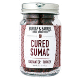 Burlap & Barrel cured sumac bottle ready to finish dishes with bright tang.