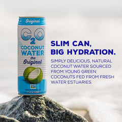 Close-up of C2O fresh coconut water with natural clarity.