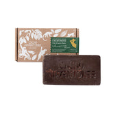 Cacao Adventures ceremonial cacao block unwrap for authentic ritual use and grounding.