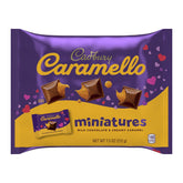 Cadbury Caramello Minis milk chocolate close-up, creamy caramel center for a smooth indulgence.