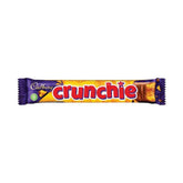 Cadbury Crunchie bar close-up showing honeycomb center and crispy texture