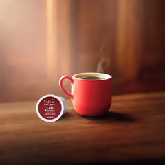 Recyclable K-Cup pod from Café Escapes highlighting eco-friendly disposal