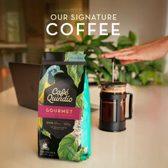 Cafe Quindio medium roast steaming coffee cup with inviting aroma.