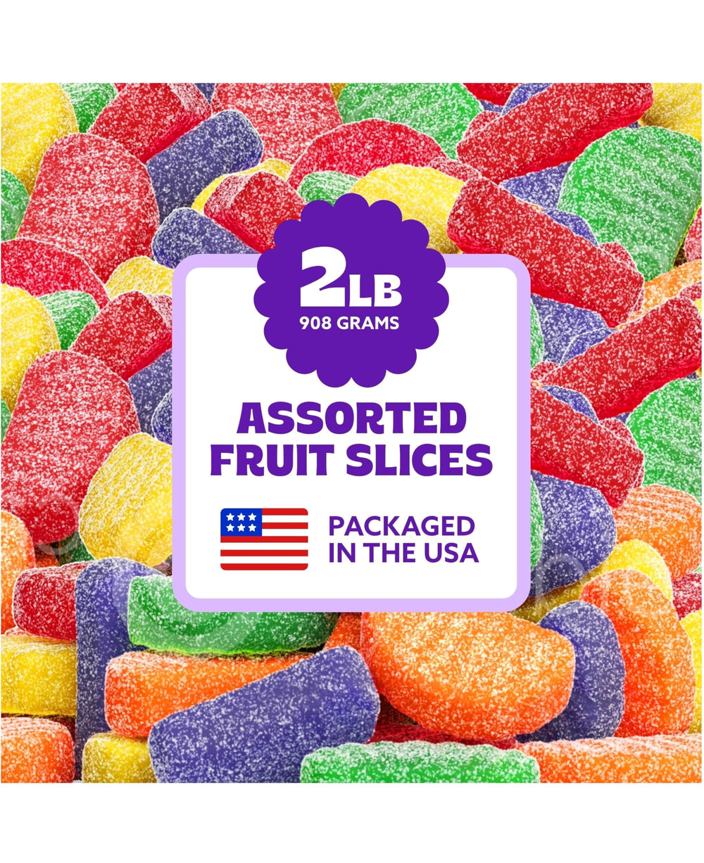 Cambie fruit slices gummy candy assortment in vibrant colors, perfect for party tables and jars.