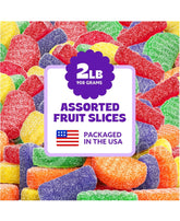 Cambie fruit slices gummy candy assortment in vibrant colors, perfect for party tables and jars.