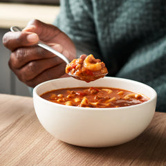 Spoonful shows Campbell's Chunky Chili Mac with kidney beans and macaroni.