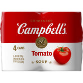 Campbell's Tomato Soup can top view highlighting six farm-grown tomatoes for rich flavor.