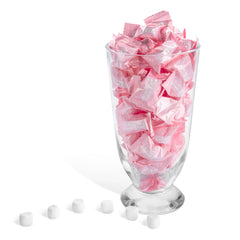 Candy Envy Baby Girl Buttermints on a white plate for an elegant dessert table