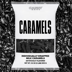 Candy Envy caramels with black wrappers displayed for gifting