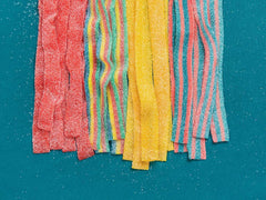Candy Club rainbow sour belts party-favor display offering bright colors and fun taste