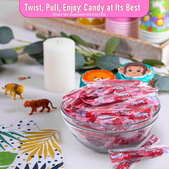 Pull-apart action of Candylish Twizlers Cherry licorice strands