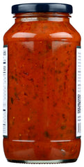Carbone tomato basil pasta sauce pouring over cooked pasta