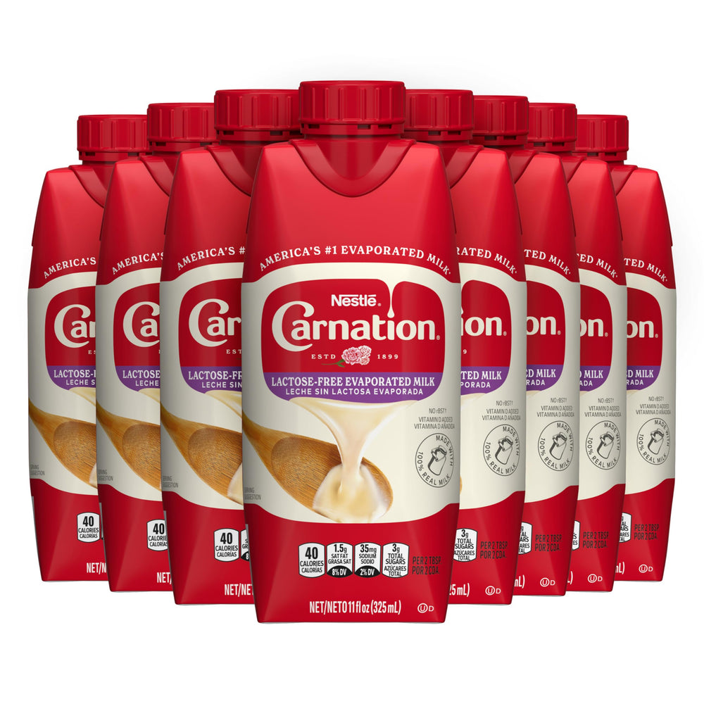 Carnation lactose-free evaporated milk bottle shows creamy texture for cooking