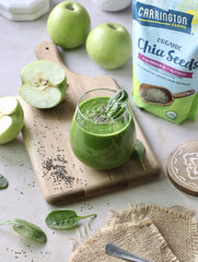 Chia seeds in a smoothie with Carrington Farms branding visible.