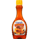 Cary's Sugar Free Low Calorie Syrup bottle pour enhances pancakes with a light maple flavor.