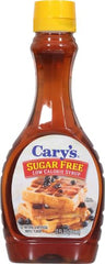 Cary's syrup on fluffy pancakes featuring a glossy maple drizzle.