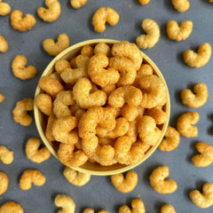 CauliPuffs Honey BBQ serving bowl — family-friendly snack for movie nights.