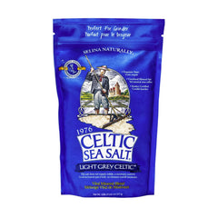 Celtic Sea Salt Light Grey Pou jar with premium grains for fresh seasoning.