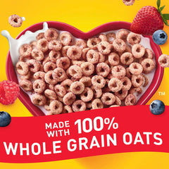 Pouring Very Berry Cheerios, gluten-free cereal ready to enjoy.