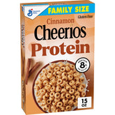 Cheerios Protein Cereal Cinnamon bowl with milk showing 8g protein per serving.