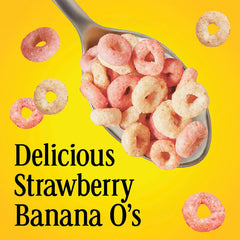 Pouring Cheerios Strawberry Banana into a bowl for breakfast