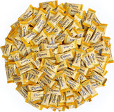 Chimes Mango Ginger Chews 2lb bag on shelf, gluten-free vegan snack.