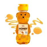 ChocZero sugar-free honey substitute bottle pour showing smooth drizzle and honey-like flow