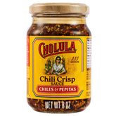 Cholula Chili Crisp bottle with wooden cap, ready to spice tacos.