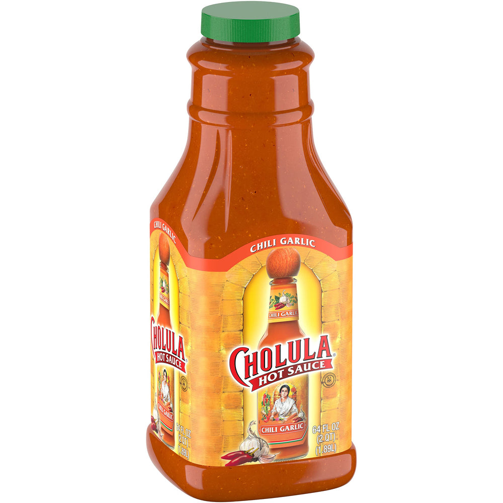 Cholula Chili Garlic Hot Sauce bottle pour adds balanced heat and aroma.