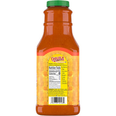 Cholula Chili Garlic Hot Sauce on fries enhances savory crunch with spice.