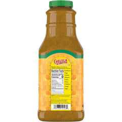 Cholula Green Pepper Hot Sauce being poured over tacos for bold flavor.