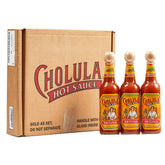 Cholula Original hot sauce bottle with wooden cap, ideal for eggs and tacos.