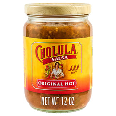Cholula Original Hot salsa bottle pour adds vibrant heat to tacos.