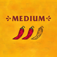 Chips dipped in Cholula Original Salsa for immediate flavor