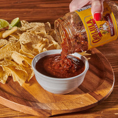 Cholula Smoky Chipotle Salsa as a dip with tortilla chips