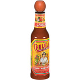 Cholula Sweet Habanero bottle pour adds tropical heat to sauces.